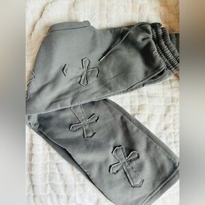 Gray sweatpants with crosses